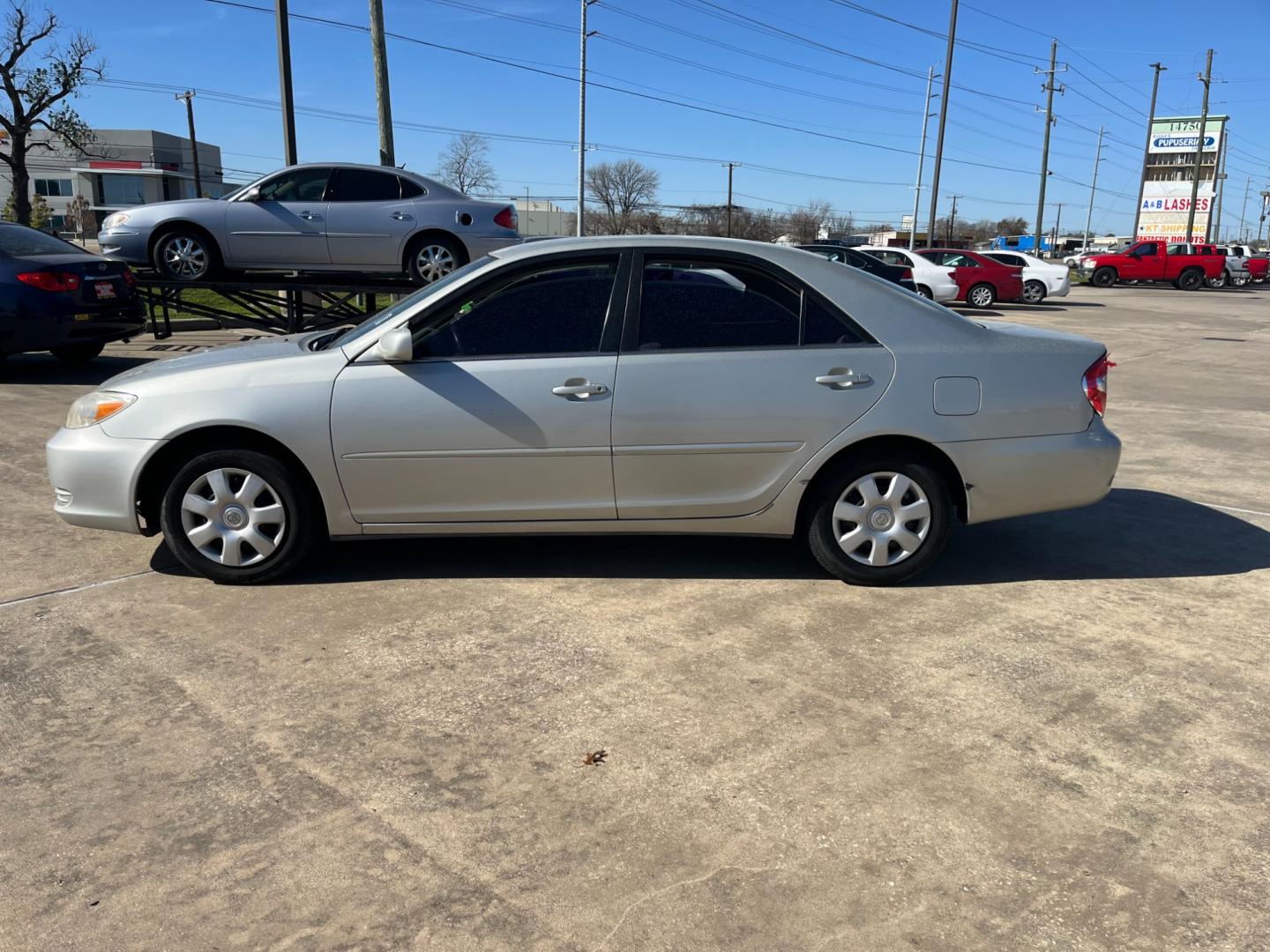 2002 SILVER /gray Toyota Camry LE (4T1BE32K72U) with an 2.4L L4 DOHC 16V engine, Automatic transmission, located at 14700 Tomball Parkway 249, Houston, TX, 77086, (281) 444-2200, 29.928619, -95.504074 - Photo#3